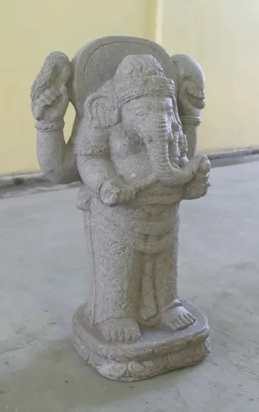 Product image of the product “Standing Ganesha, 62 cm height, riverstone, stonemasony ”